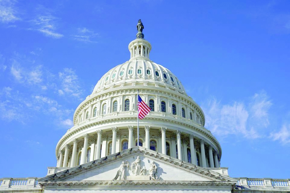 The US Capitol is seen as Congress continues work on passing a $1.66 trillion government funding bill in Washington. - Reuters
