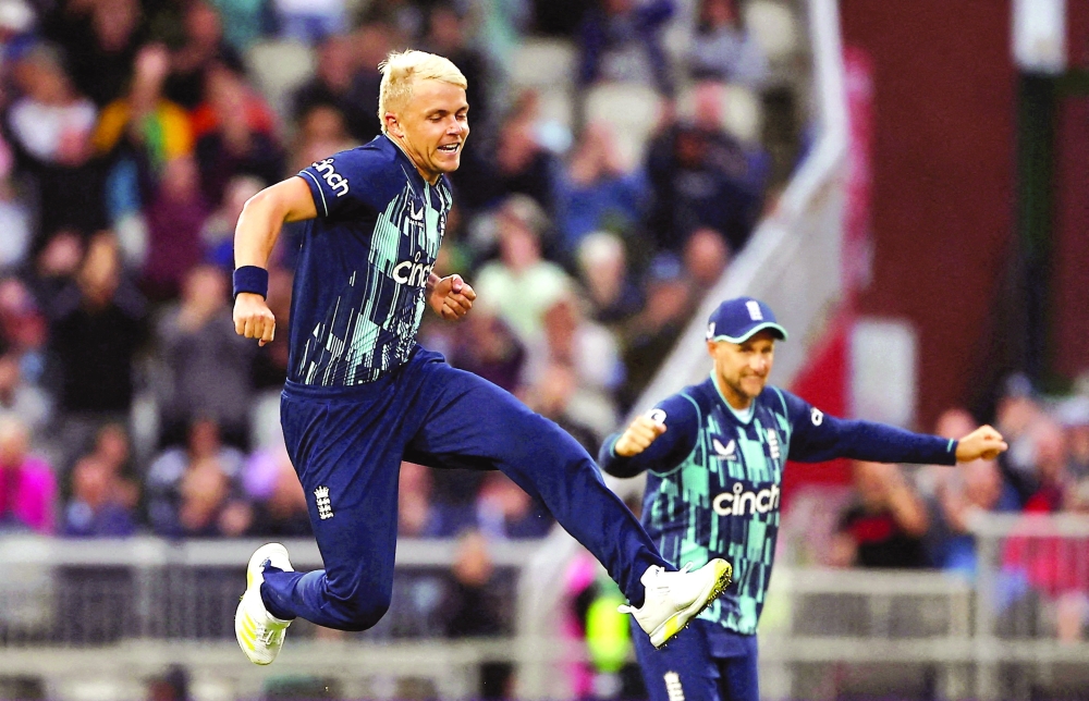 FILE PHOTO: Cricket - England v South Africa - ODI series - Old Trafford, Manchester, Britain - July 22, 2022 England's Sam Curran celebrates after taking the wicket of South Africa's David Miller Action Images via Reuters