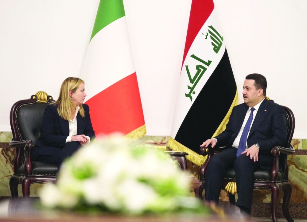 Iraqi Prime Minister Mohammed Shia al Sudani with Italian Prime Minister Giorgia Meloni in Baghdad. - Reuters 