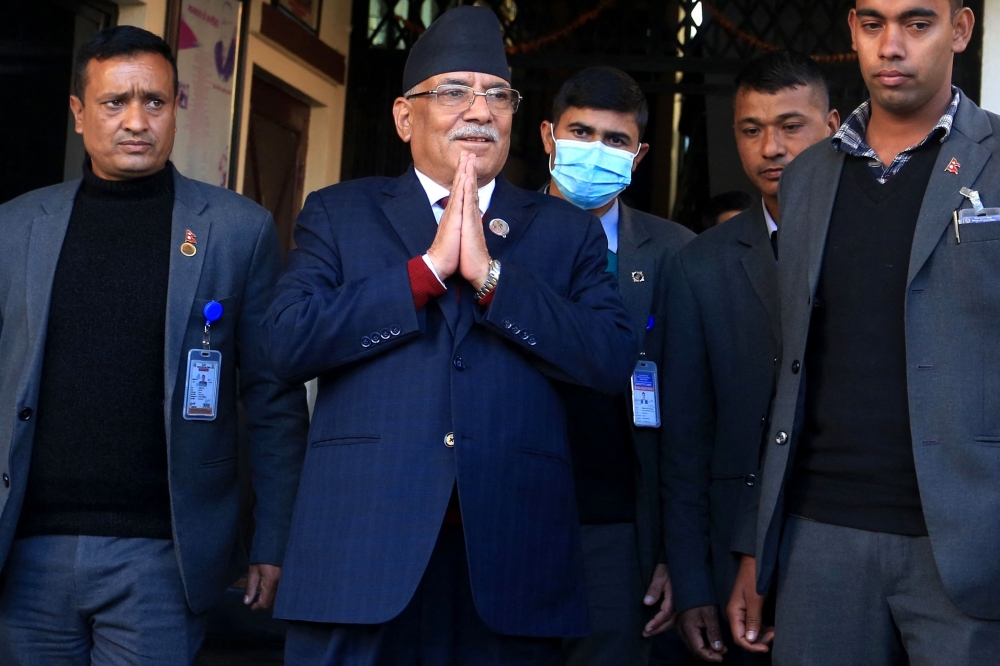 Nepal's former guerrilla leader Pushpa Kamal Dahal (2L)