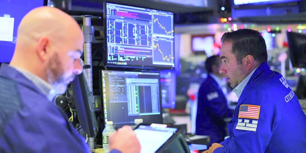 Traders work on the floor of the New York Stock Exchange (NYSE) in New York City. — Reuters