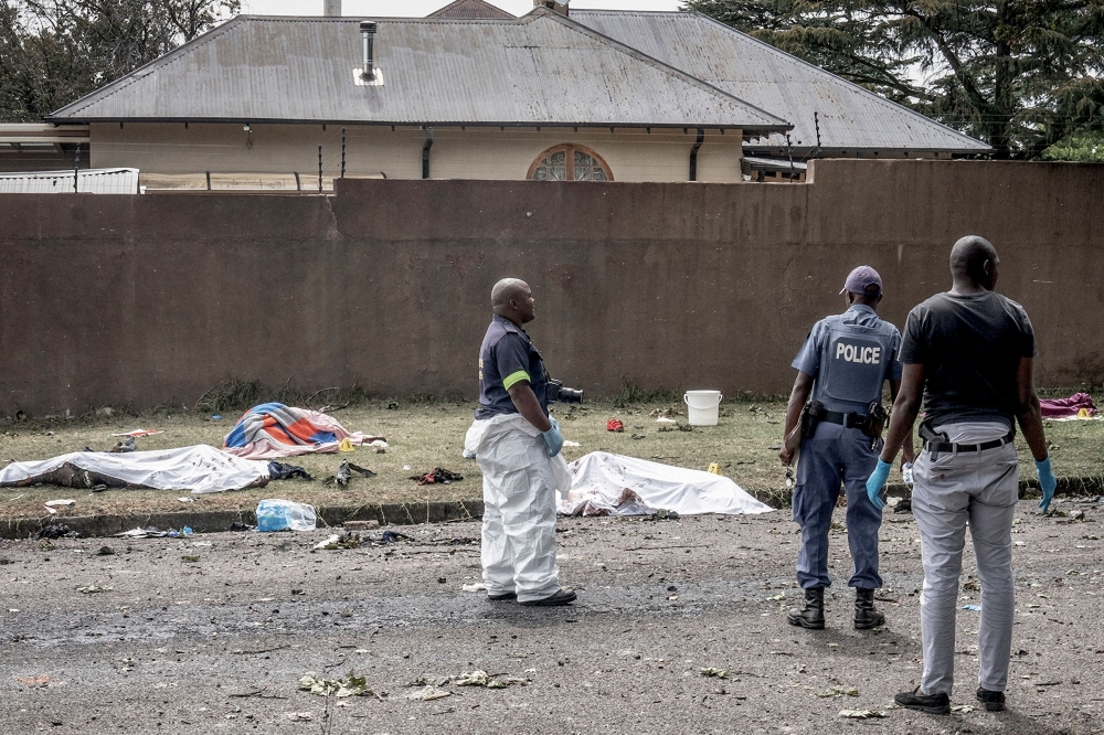 South African Police Service (SAPS) officers and forensic experts 