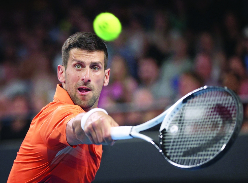 Tennis - Adelaide International - Memorial Drive Tennis Club, Adelaide, Australia - January 6, 2023 Serbia's Novak Djokovic in action during his quarter final match against Canada's Denis Shapovalov REUTERS/Loren Elliott
