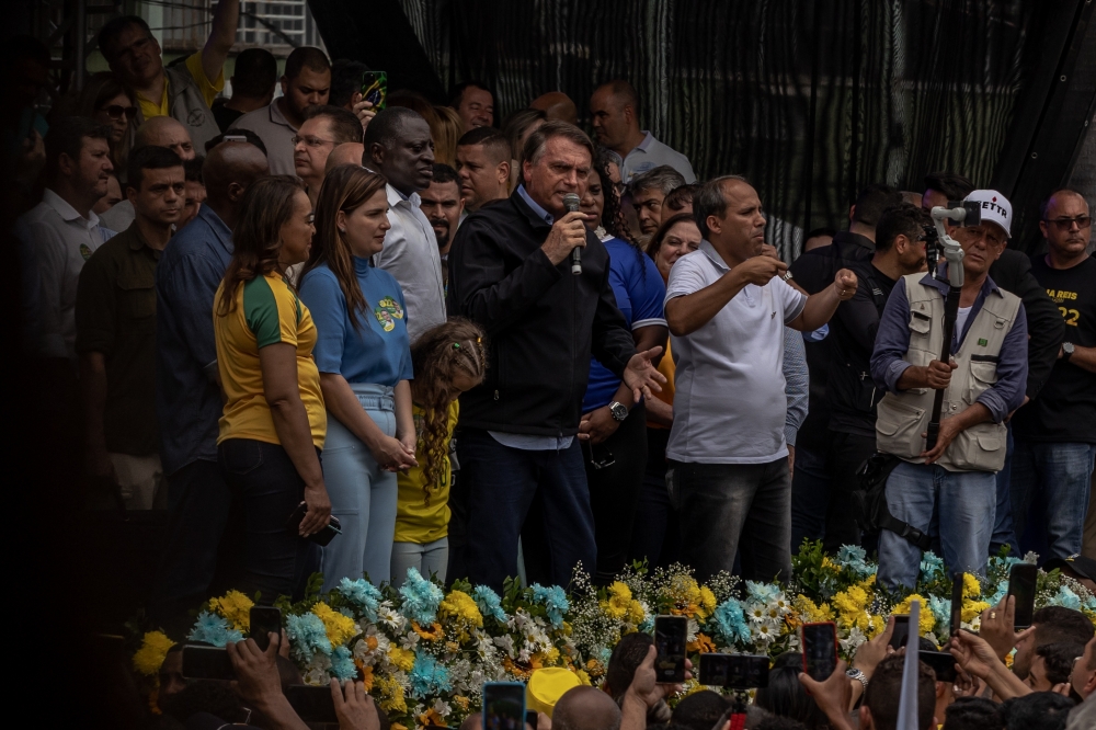 President Jail Bolsonaro of Brazil speaks at his re-election campaign rally in Rio de Janeiro on Oct. 14, 2022. (Maria Magdalena Arrellaga/The New York Times)