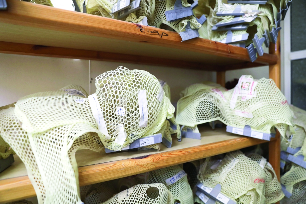 Radiotherapy masks are pictured at the National Oncology Centre in Sanaa. - Reuters