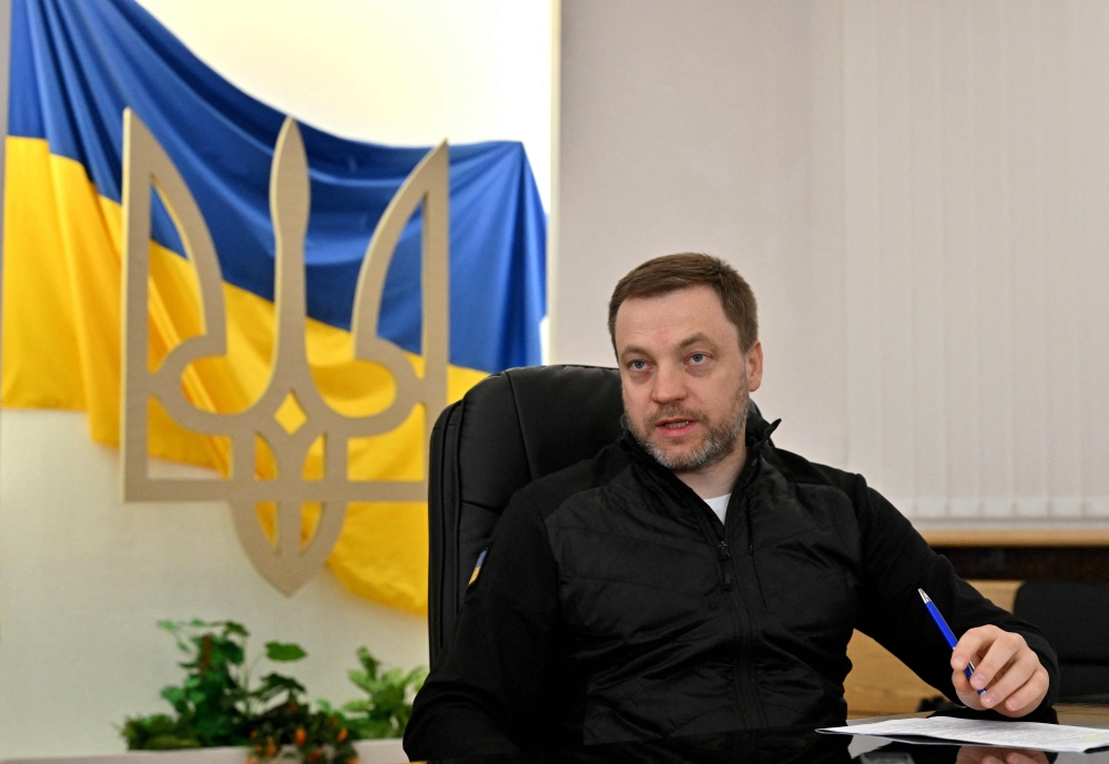 In this file photo taken on June 09, 2022 Ukraine's Interior Minister Denys Monastyrsky talks with journalists during an interview for AFP in Kyiv.