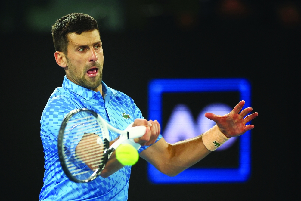 Tennis - Australian Open - Melbourne Park, Melbourne, Australia - January 19, 2023 Serbia's Novak Djokovic in action during his second round match against France's Enzo Couacaud REUTERS/Carl Recine
