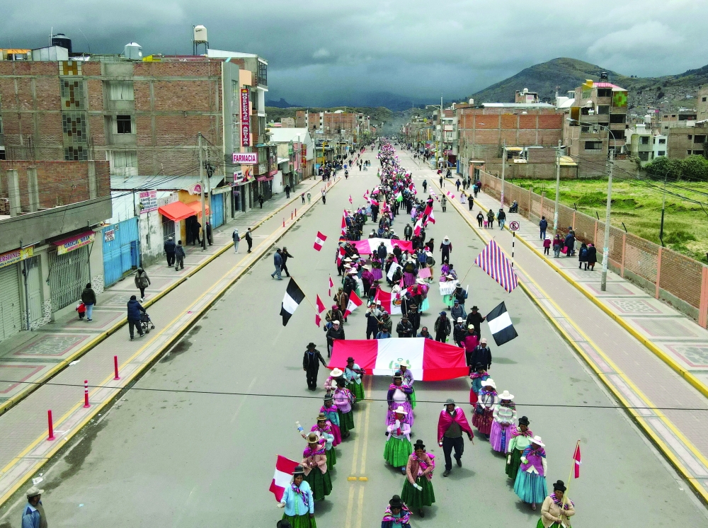 Demonstrators hold a protest against the government of President Dina Boluarte and to demand her resignation in Puno, Peru. - AFP 