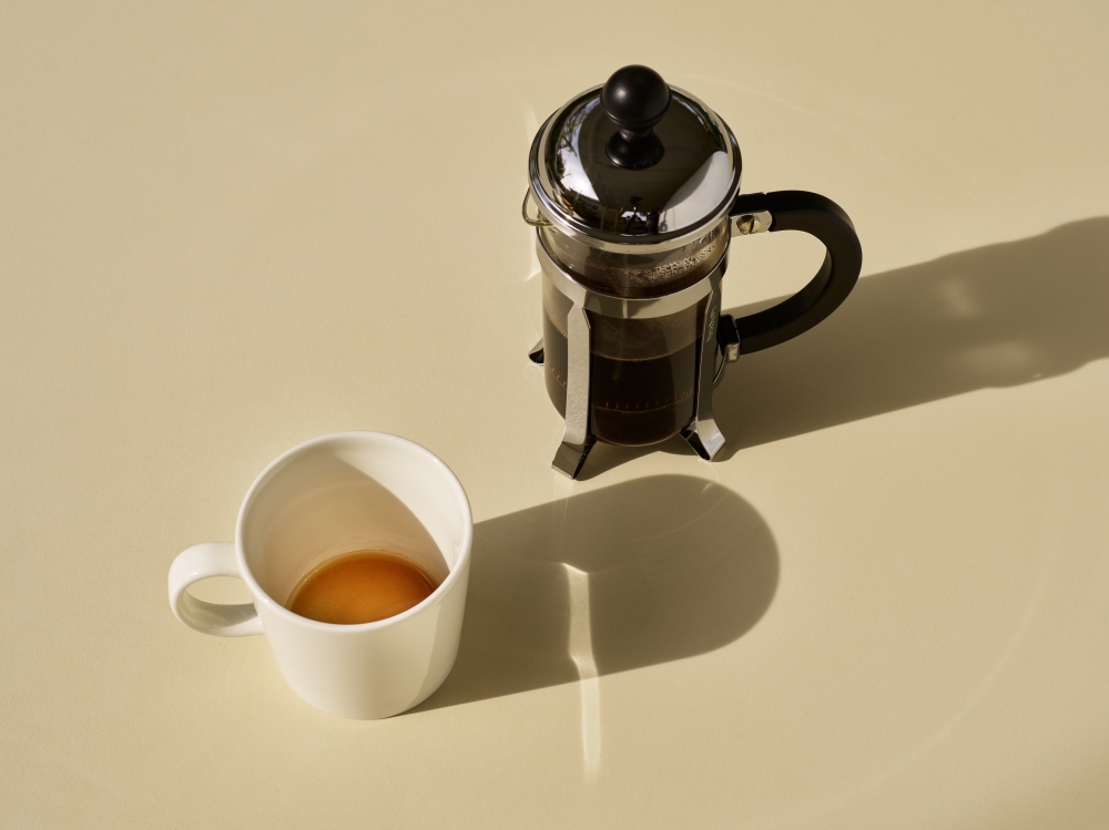 A French press and coffee mug in Palm Springs, Calif. on Jan. 14, 2023. (Joyce Lee/The New York Times)