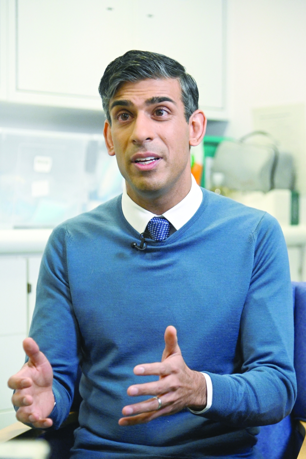 British Prime Minister Rishi Sunak attends a media broadcast interview during his visit to Berrywood Hospital in Northampton, Britain, on Monday. - Reuters