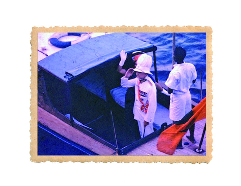 The British Resident waving ‘Goodbye Zanzibar’ to officials.