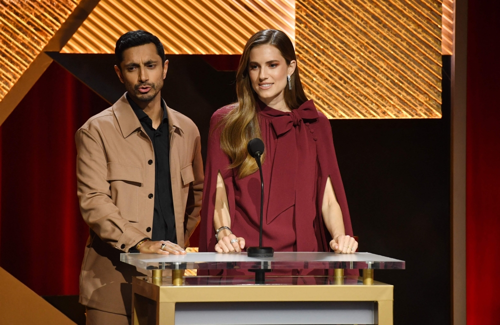 British actor Rizwan Ahmed (L) and US actress Allison Williams announce the nominees during the 95th Academy Awards nominations announcement at the Samuel Goldwyn Theater in Beverly Hills, California, on January 24, 2023.  (Photo by VALERIE MACON / AFP)

