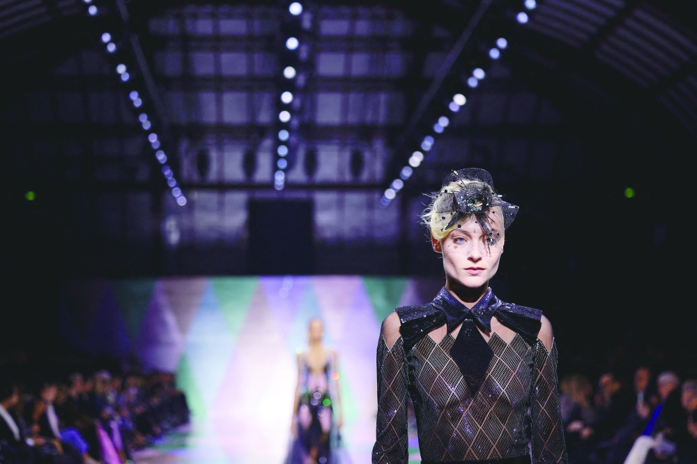 A model presents a creation by designer Giorgio Armani as part of his Haute Couture Spring/Summer 2023 collection show for fashion house Giorgio Armani Prive in Paris, France, January 24, 2023. REUTERS/Sarah Meyssonnier
