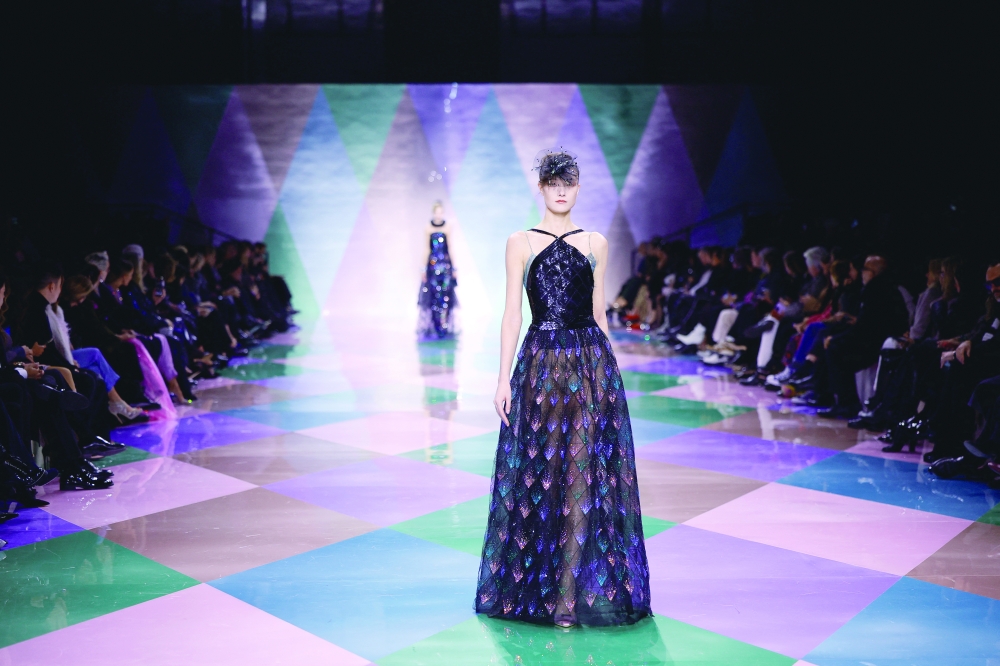 A model presents a creation by designer Giorgio Armani as part of his Haute Couture Spring/Summer 2023 collection show for fashion house Giorgio Armani Prive in Paris, France, January 24, 2023. REUTERS/Sarah Meyssonnier
