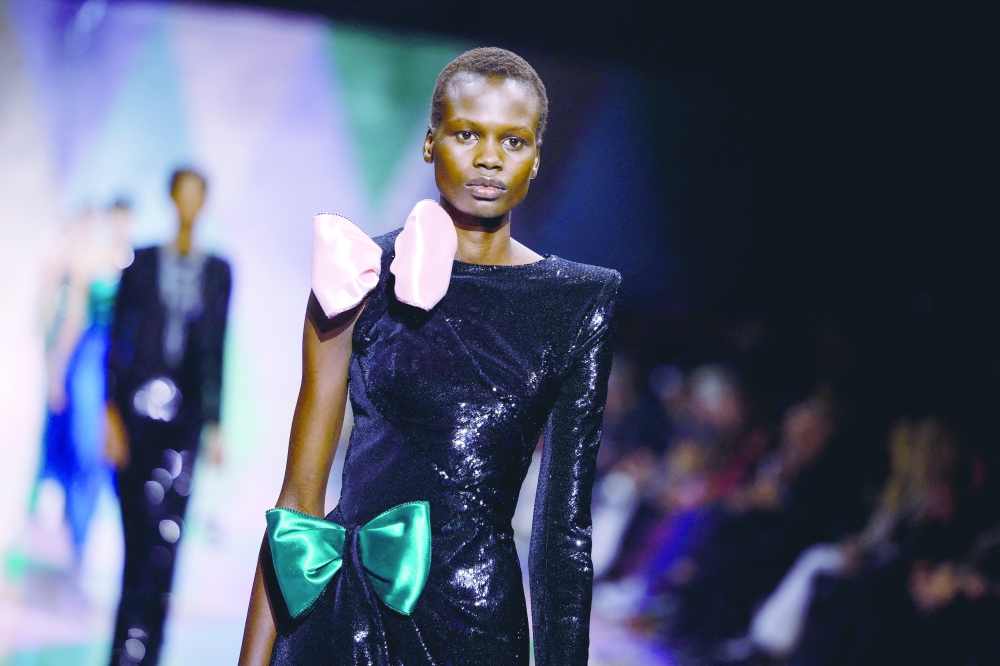 A model presents a creation by designer Giorgio Armani as part of his Haute Couture Spring/Summer 2023 collection show for fashion house Giorgio Armani Prive in Paris, France, January 24, 2023. REUTERS/Sarah Meyssonnier
