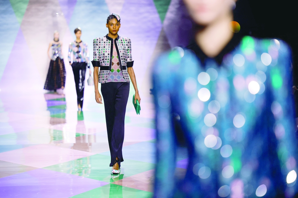 Models present creations by designer Giorgio Armani as part of his Haute Couture Spring/Summer 2023 collection show for fashion house Giorgio Armani Prive in Paris, France, January 24, 2023. REUTERS/Sarah Meyssonnier
