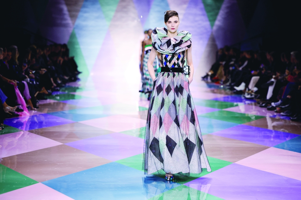 A model presents a creation by designer Giorgio Armani as part of his Haute Couture Spring/Summer 2023 collection show for fashion house Giorgio Armani Prive in Paris, France, January 24, 2023. REUTERS/Sarah Meyssonnier
