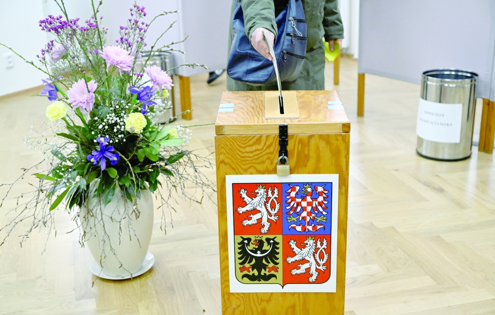 A person casts a vote during the country's presidential election run-off, at a polling station in Pruhonice, near Prague, Czech Republic. - Reuters

