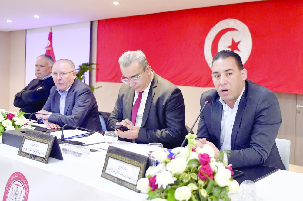 President of the Tunisian Forum for Economic and Social Rights (Ftdes) Abderrahmane Hedhil, Secretary General, Tunisian General Labor Union (UGTT) Noureddine Taboub, President, Tunisian Bar Association Hatem Meziou, and President of the Tunisian Human Rights League Bassem Trifi attend a press conference to present the  national rescue initiative in Tunis. - AFP