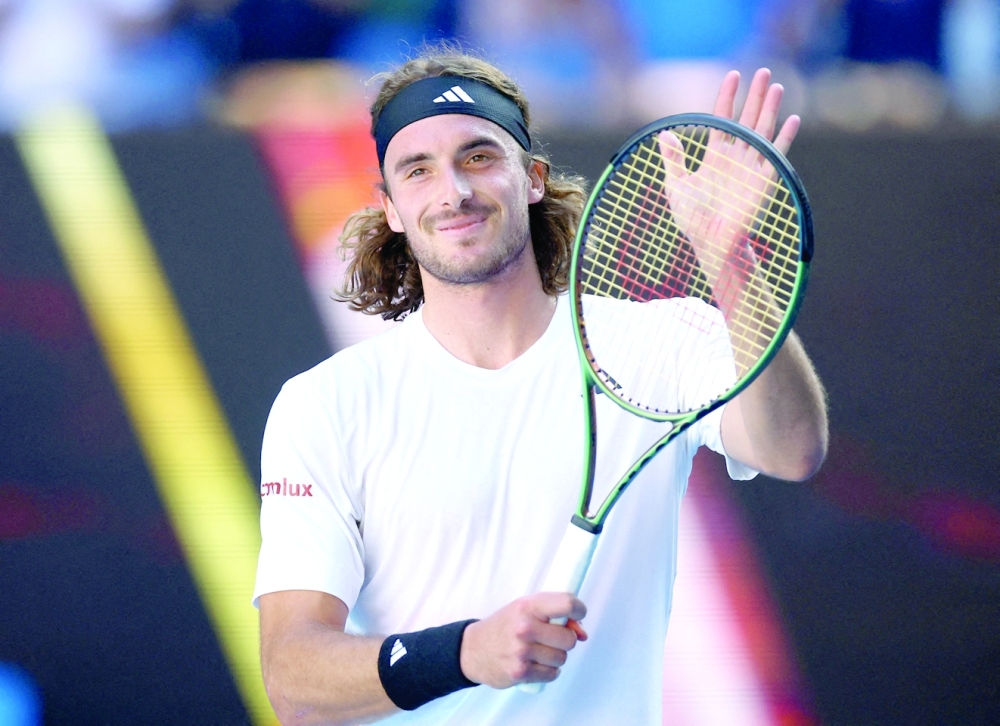 Tennis - Australian Open - Melbourne Park, Melbourne, Australia - January 27, 2023 Greece’s Stefanos Tsitsipas celebrates winning his semi final match against Russia's Karen Khachanov REUTERS/Hannah Mckay     TPX IMAGES OF THE DAY
