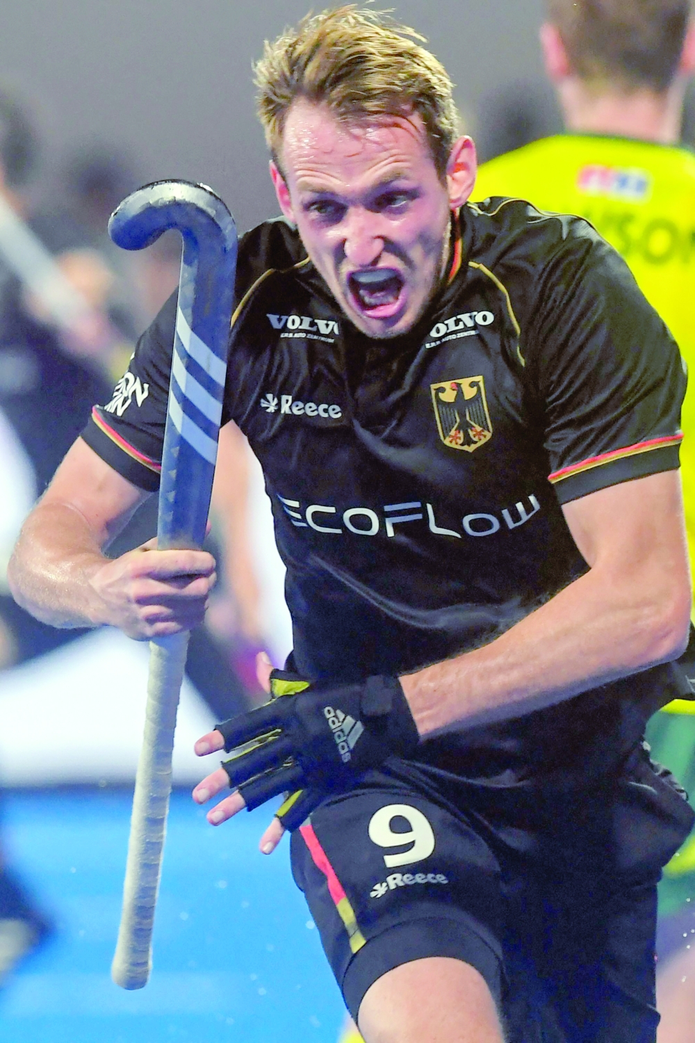 Germany's Niklas Wellen celebrates after scoring the winning goal during the men's semi-final match between Australia and Germany at the FIH Odisha Field Hockey Men's World Cup 2023, in Bhubaneswar on January 27, 2023.  (Photo by Dibyangshu SARKAR / AFP)

