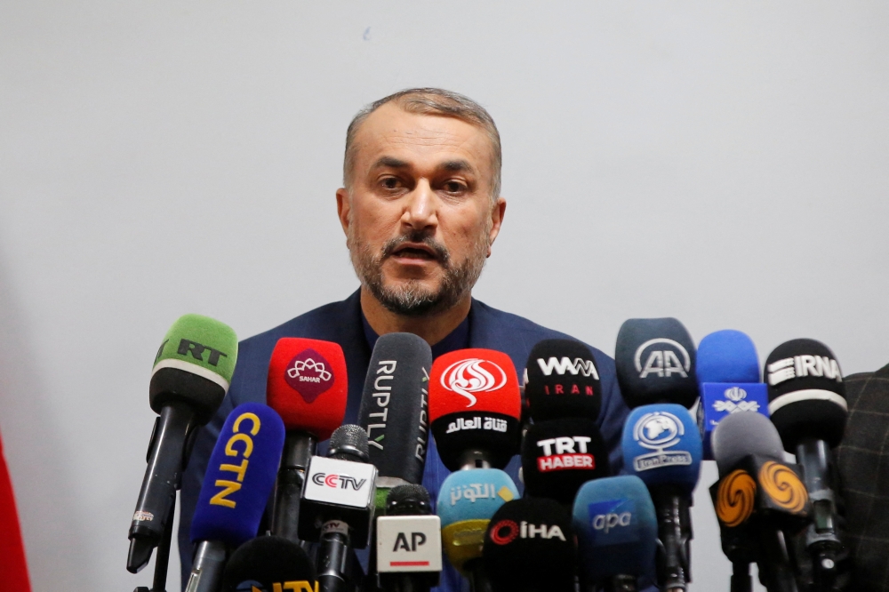 Iran's Foreign Minister Hossein Amir-Abdollahian speaks during a joint news conference with the ambassador of Azerbaijan to Iran Ali Alizada in Tajrish hospital in Tehran, Iran, January 27, 2023. 