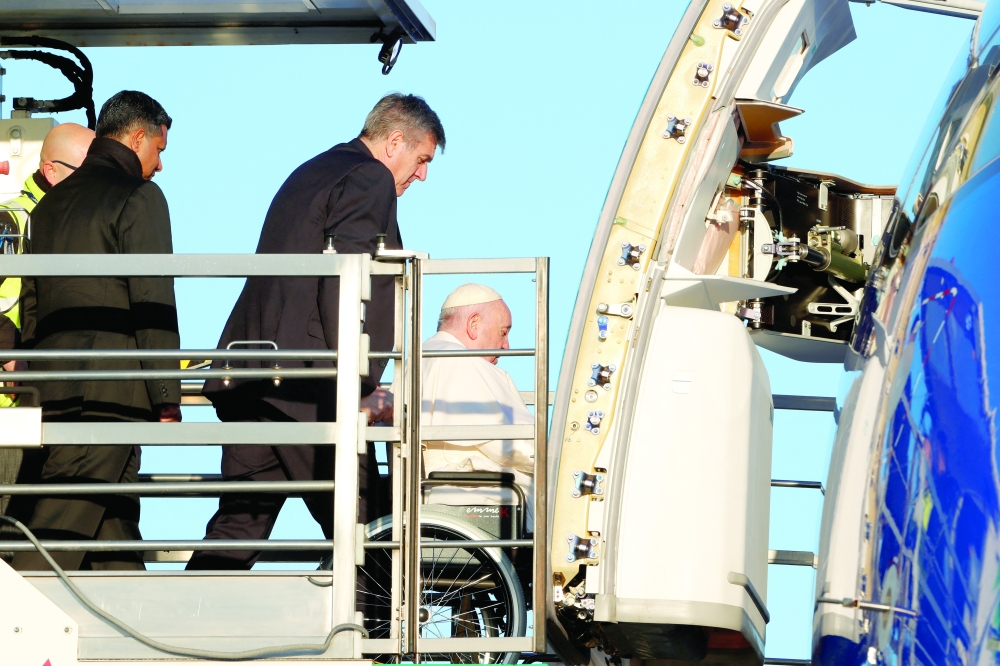 Pope Francis boards the papal plane ahead of his apostolic visit to the Democratic Republic of Congo and South Sudan, at Fiumicino airport in Rome, Italy, on Tuesday. - Reuters