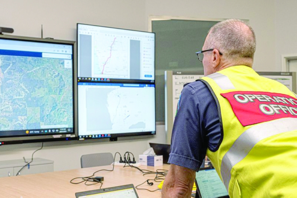 A member of the Incident Management Team coordinates the search for a radioactive capsule at the Emergency Services Complex in Cockburn, Australia. -- Reuters
