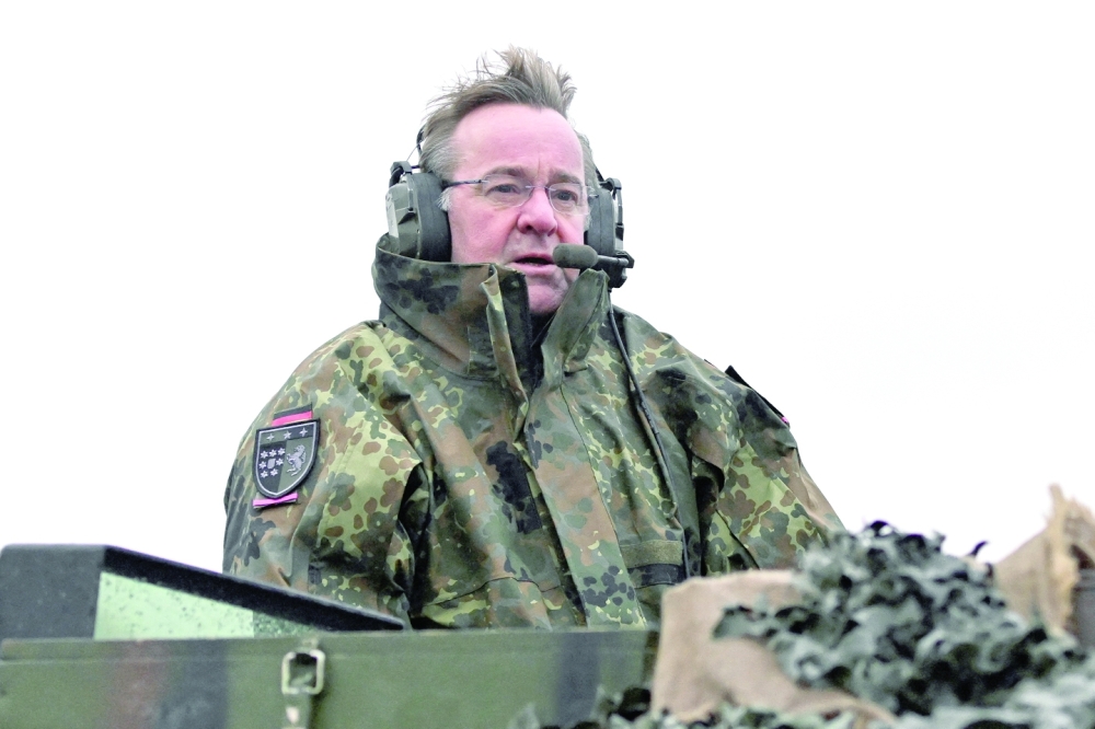 German Defence Minister Boris Pistorius rides a tank as he visits Leopard II tanks that are due to be supplied to Ukraine at the tank brigade Lipperland of Germany's army and part of the Bundeswehr, in Augustdorf, Germany, on Wednesday. - Reuters