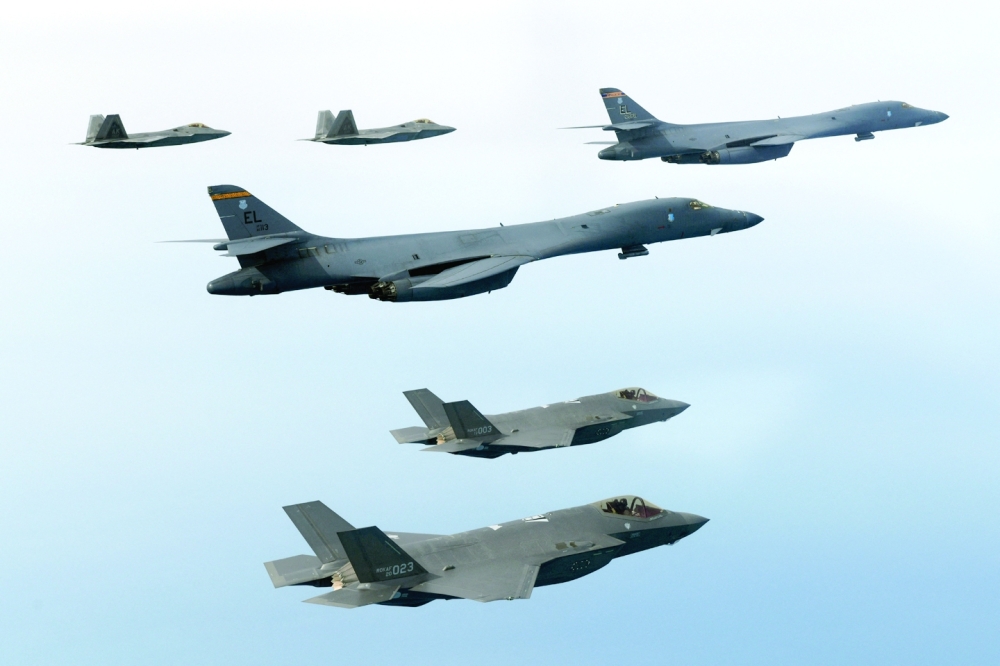 South Korean and US Air Forces conducting a combined air training with South Korean F-35A fighters, US B-1B strategic bombers, and F-22 and F-35B fighters participating in the skies over the West Sea, in South Korea. - Reuters
