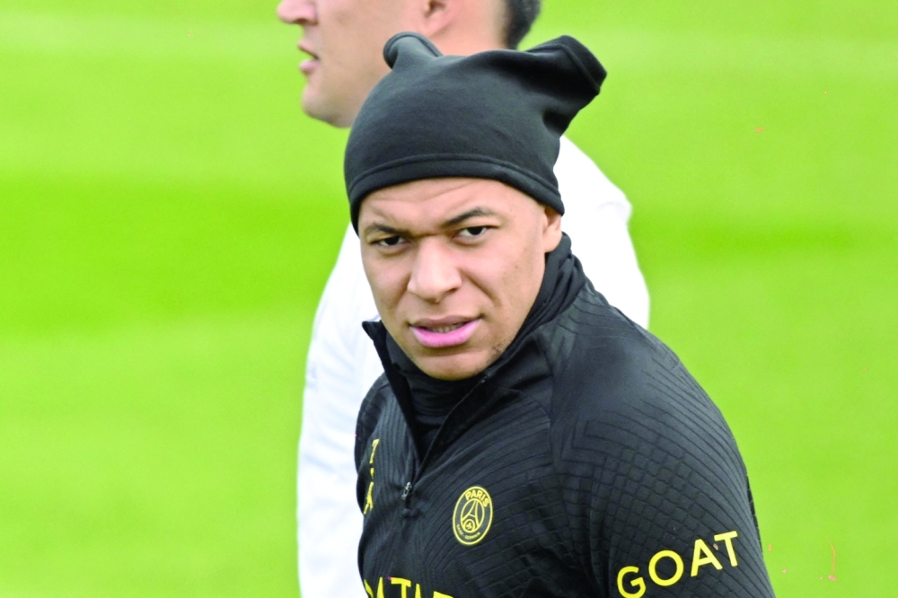 Paris Saint-Germain's French forward Kylian Mbappe takes part in a training session at the club's "Camp des Loges" training ground in Saint-Germain-en-Laye, west of Paris on January 31, 2023.  (Photo by Bertrand GUAY / AFP)

