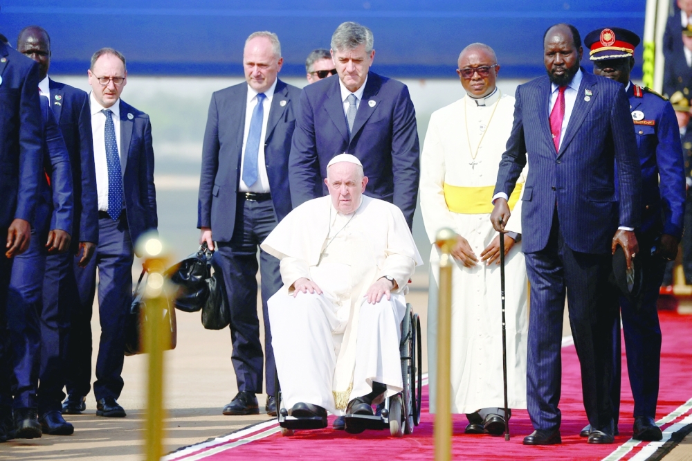Pope Francis disembarks a plane at Juba International Airport during his apostolic journey, in Juba, South Sudan, February 3, 2023. REUTERS/Yara Nardi
