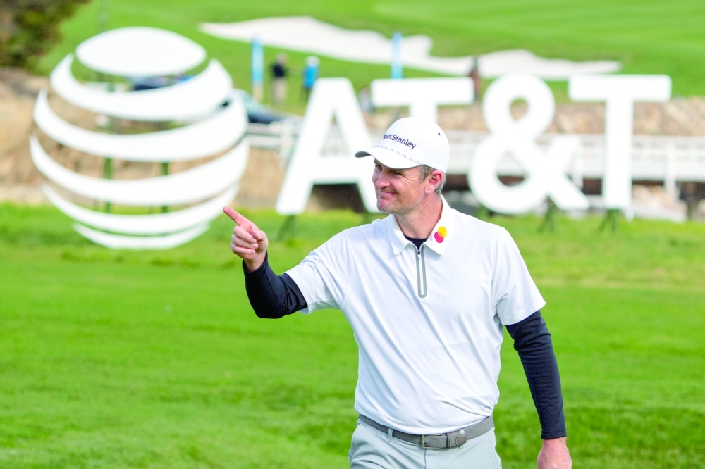 February 2, 2023; Pebble Beach, California, USA; Justin Rose celebrates after his putt on the 17th hole during the first round of the AT&T Pebble Beach Pro-Am golf tournament at Pebble Beach Golf Links. Mandatory Credit: Kyle Terada-USA TODAY Sports
