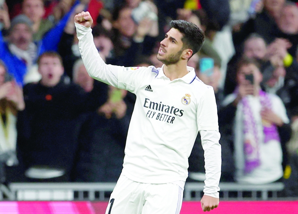 Soccer Football - LaLiga - Real Madrid v Valencia - Santiago Bernabeu, Madrid, Spain - February 2, 2023 Real Madrid's Marco Asensio celebrates scoring their first goal REUTERS/Juan Medina
