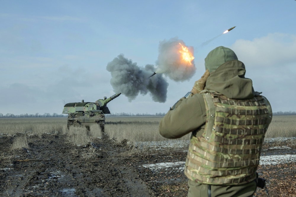 Ukrainian army from the 43rd Heavy Artillery Brigade fire the German howitzer Panzerhaubitze 2000, called Tina by the unit, amid Russia's attack on Ukraine, near Bahmut, in Donetsk region. - Reuters
