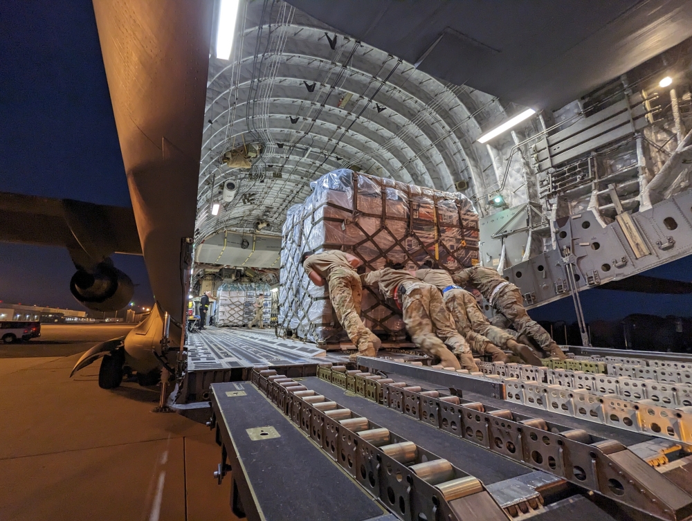 A photo provided by the U.S. Air Force shows supplies for an urban search and rescue team from Fairfax County, Va., being loaded onto a transport plane for a flight to Turkey at Dover Air Force Base, Del. (U.S. Air Force via The New York Times)