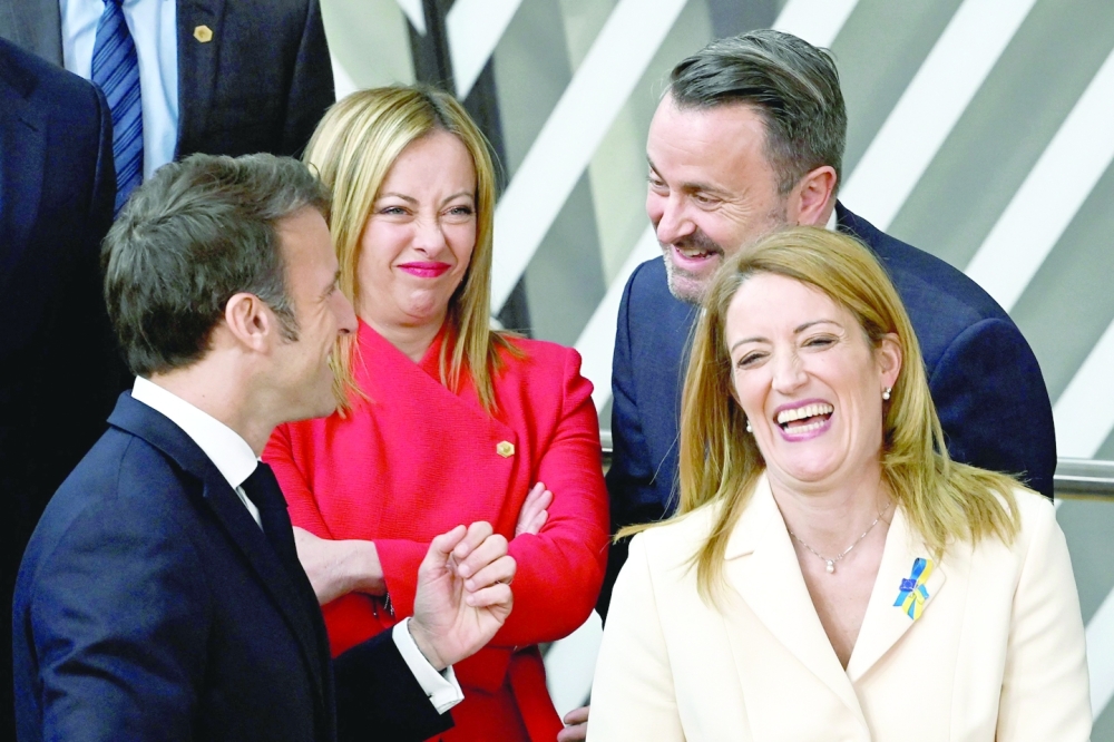 European leaders share a laugh ahead of a round-table meeting in Brussels. -- AFP