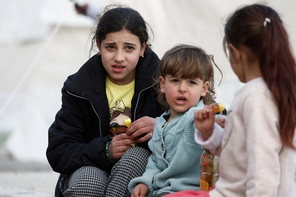 Displaced children at a stadum in Hatay, Turkey, on Thursday. — Reuters