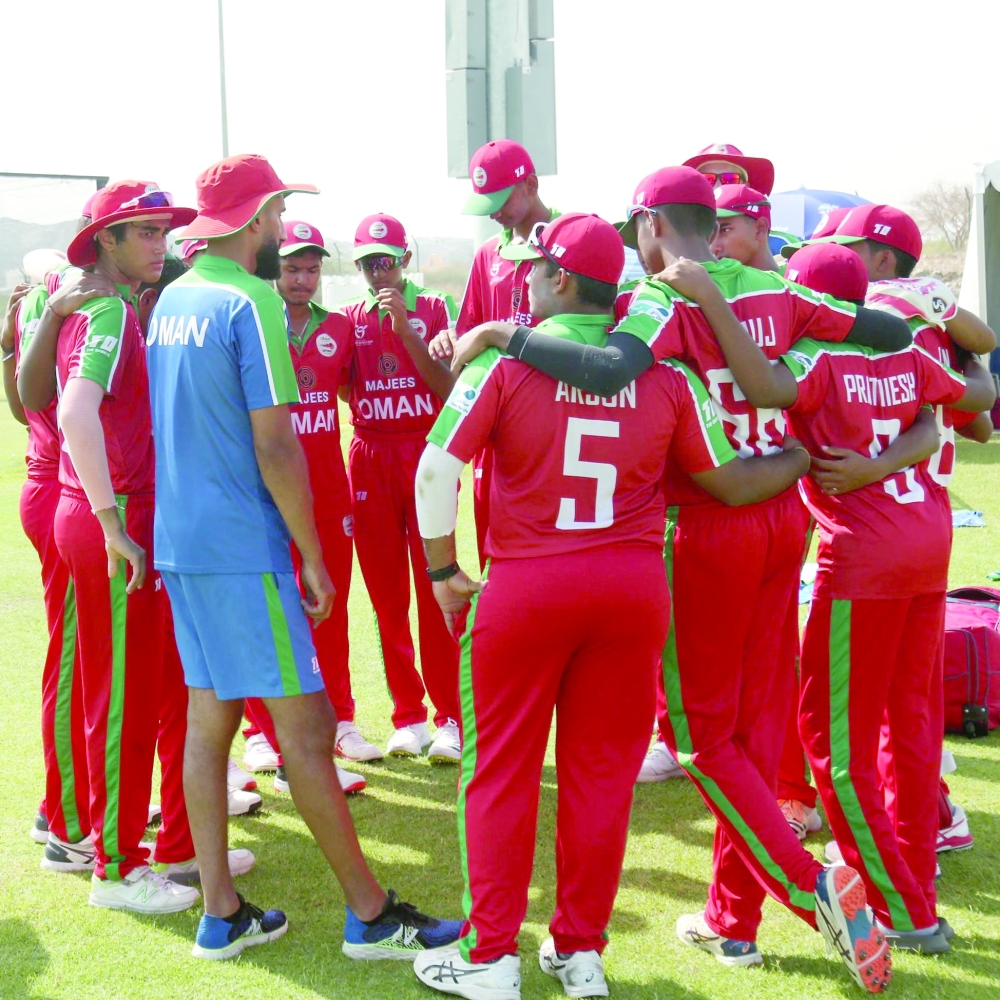 Coach Adeel Shafique talking to the Oman U19 boys during a practice session.