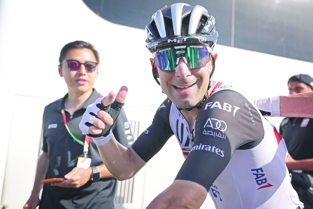 Italian Diego Ulissi of UAE Team Emirates reacts after winning the fourth stage of the 2023 Tour of Oman, from Izki to Yitti Hills, on February 14, 2023. (Photo by Thomas SAMSON / AFP)