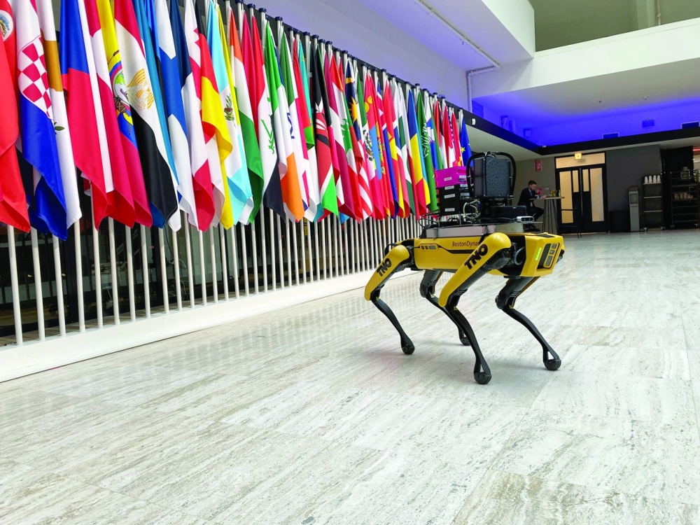 A robotic dog is shown at the Responsible Artificial Intelligence in the Military summit, on responsible use of military artificial intelligence, in The Hague. -- Reuters 