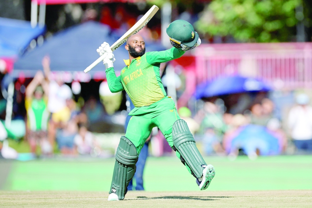 (FILES) In this file photo taken on January 29, 2023 South Africa's Temba Bavuma celebrates after scoring a century (100 runs) during the second one day international (ODI) cricket match between South Africa and England at Mangaung Oval in Bloemfontein. South Africa on February 17, 2023 named Temba Bavuma as their first Black African Test captain, replacing axed Dean Elgar. (Photo by Marco Longari / AFP)

