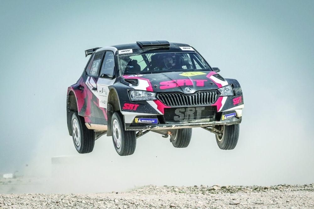 Flat out with Mads Ostberg in Qatar.