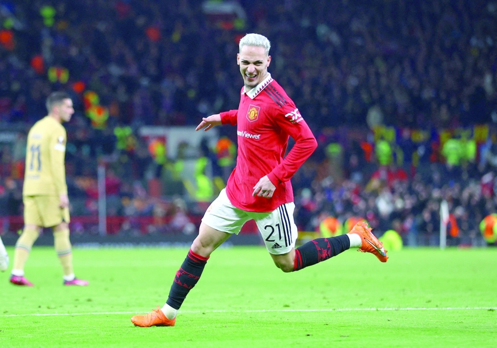Soccer Football - Europa League - Play-Off Second Leg - Manchester United v FC Barcelona - Old Trafford, Manchester, Britain - February 23, 2023 Manchester United's Antony celebrates scoring their second goal REUTERS/Carl Recine
