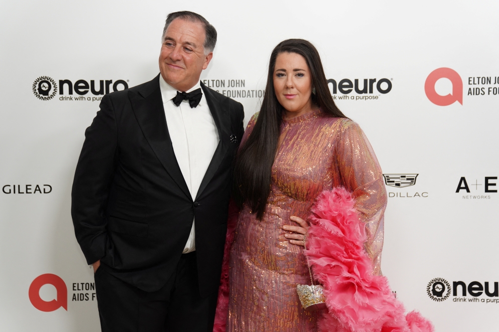 David Pridham and Emberli Pridham pose 