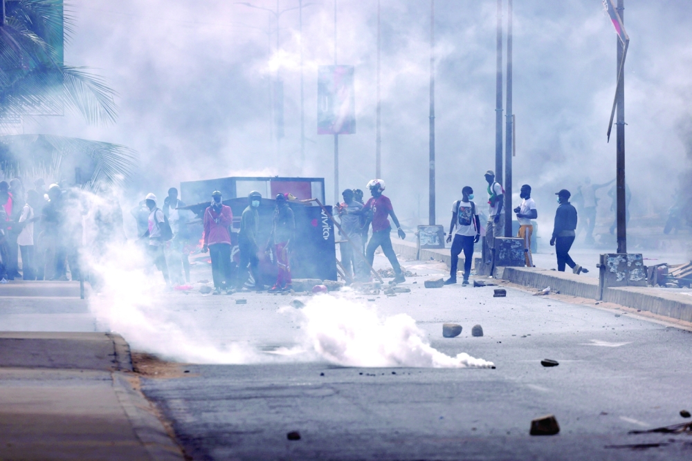 Supporters of Senegal opposition leader Ousmane Sonko during clash with security forces ahead of court appearance for a libel case against him in Dakar. — Reuters