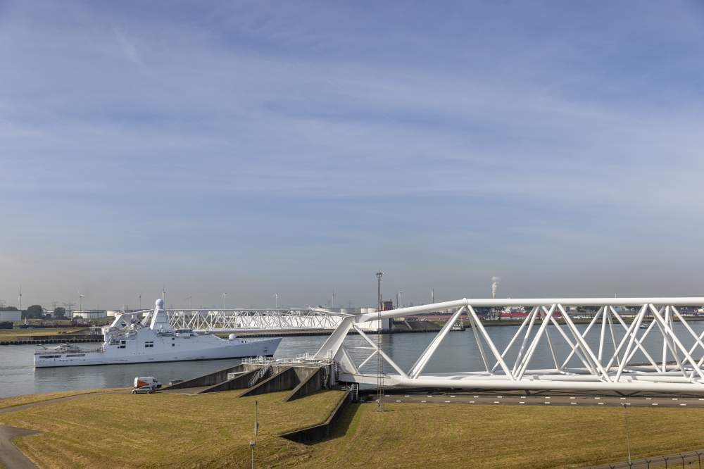 A boat passes through the Maeslantkering, a storm surge barrier, in Hoek van Holland, the Netherlands, Sept. 6, 2021. It was constructed in response to water-level predictions. (Ilvy Njiokiktjien/The New York Times)