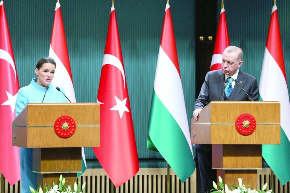 Hungarian President Katalin Novak (L) and Turkish President Recep Tayyip Erdogan address a joint press conference following their meeting at the Presidential Complex in Ankara. — AFP