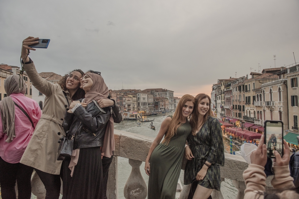 Tourists in central Venice, Italy on May 4, 2022. (Laetitia Vancon/The New York Times)