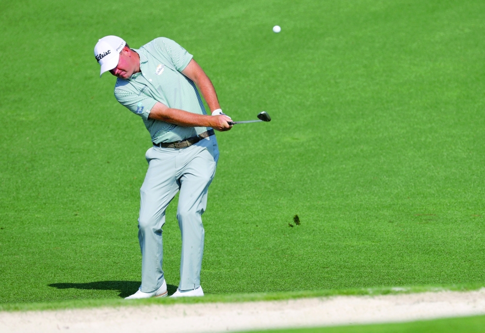 Golf - The Masters - Augusta National Golf Club - Augusta, Georgia, U.S. - April 5, 2023  Tom Hoge of the U.S. hits his approach on the 2nd during a practice round REUTERS/Brian Snyder
